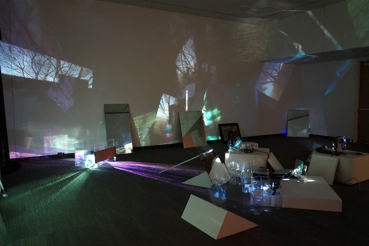    1/2 EnZeitraum, 2015 Video installation; video,glass, various objects Displayed at UNI Gallery of Art